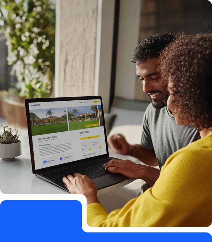 Couple viewing a home on the REVESTY website