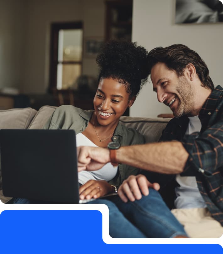 Couple viewing a home on the REVESTY website